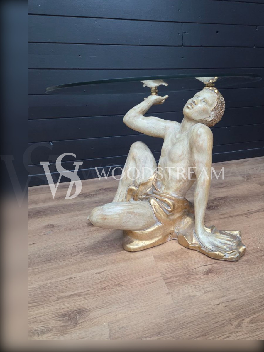 Стол со стеклянной столешницей и подстольем в форме мавра