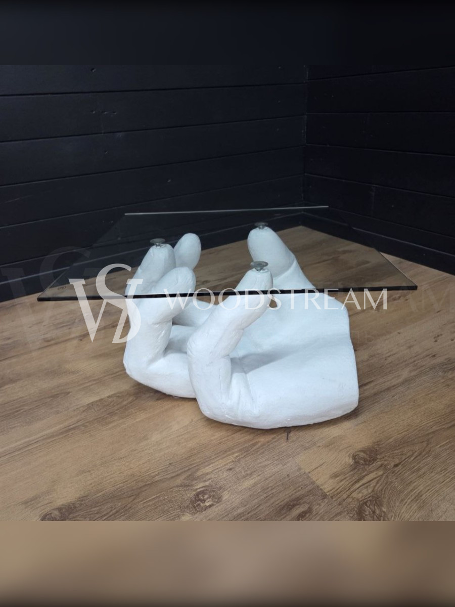 Стол со стеклянной столешницей и подстольем в форме руки/ладони