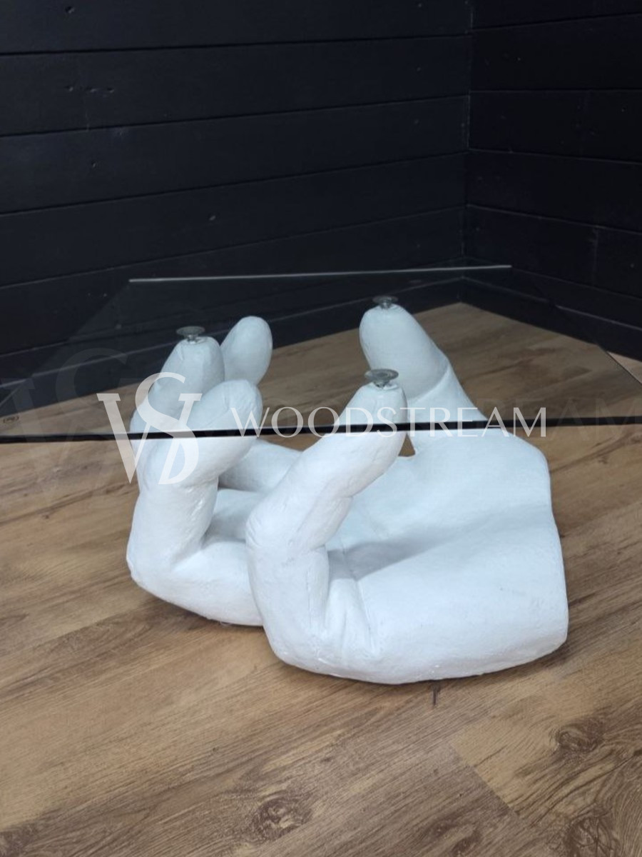 Стол со стеклянной столешницей и подстольем в форме руки/ладони