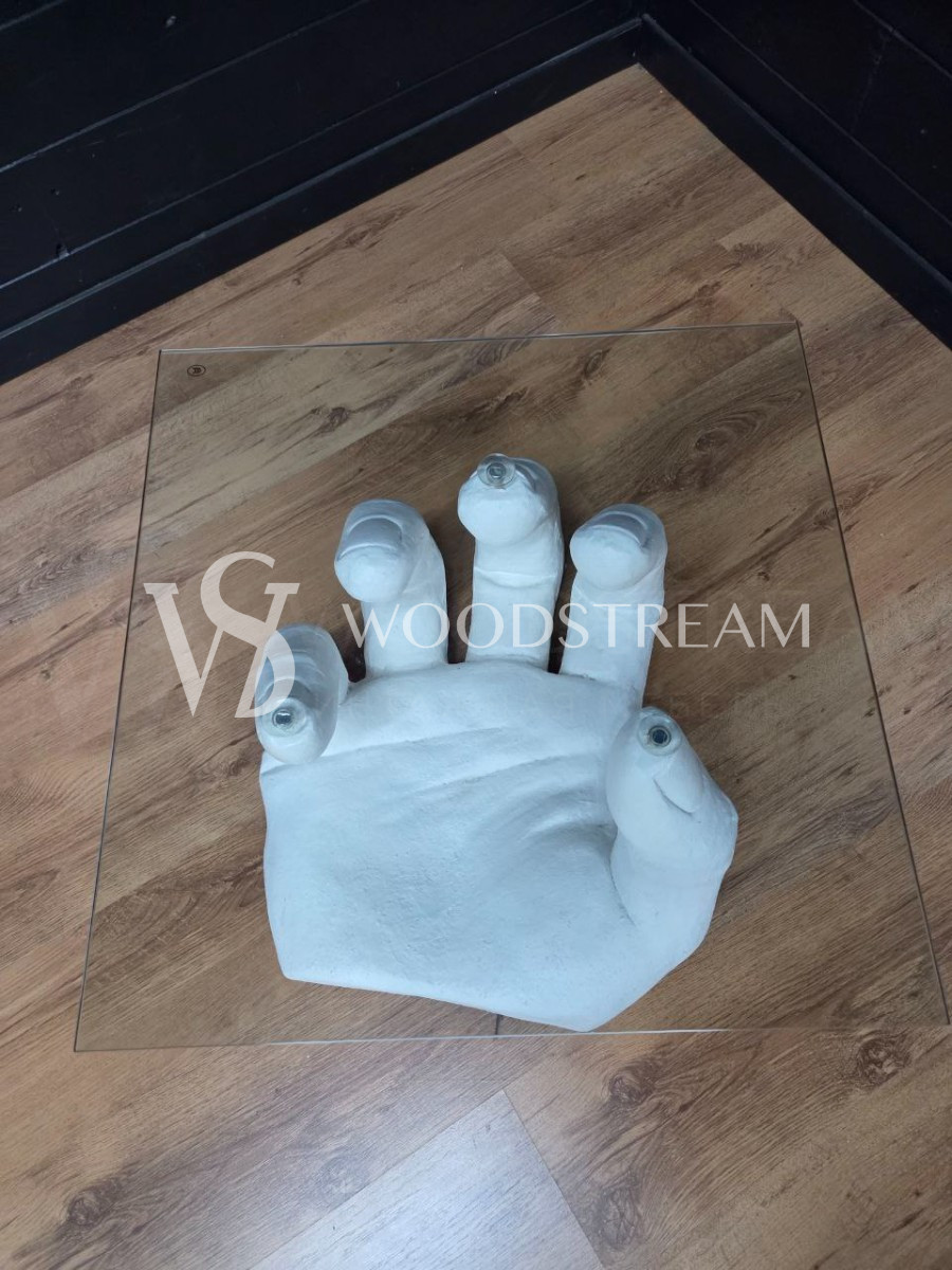 Стол со стеклянной столешницей и подстольем в форме руки/ладони