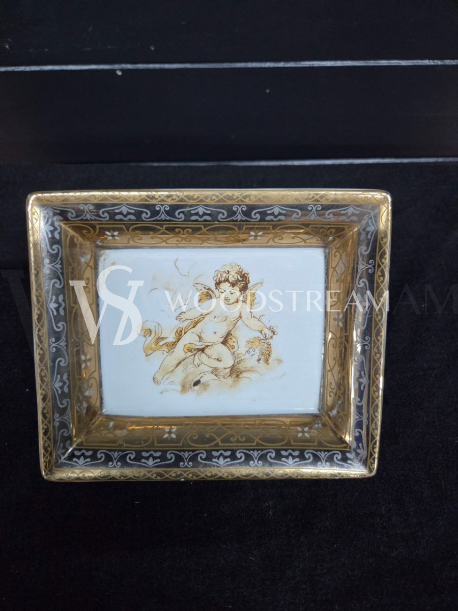 Тарелка с путти Limoges