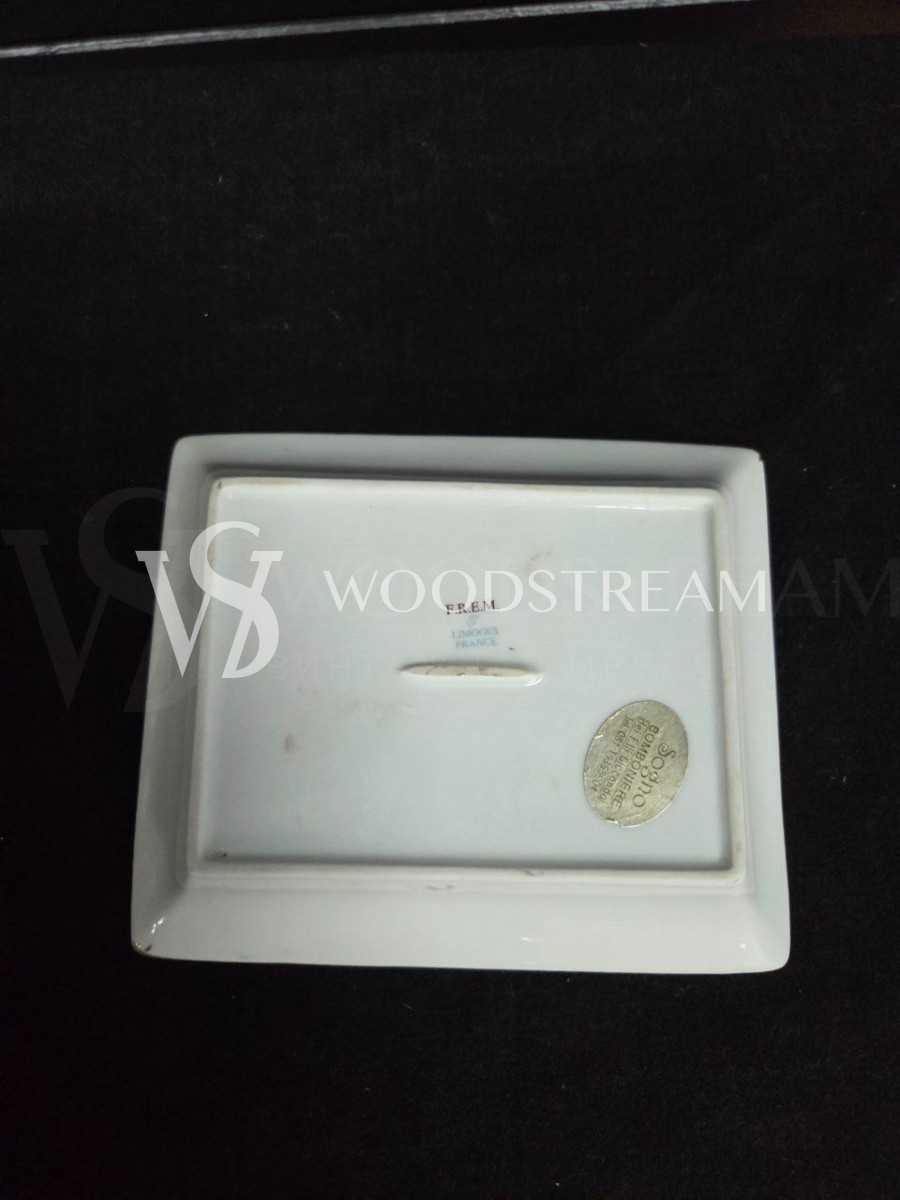 Тарелка с путти Limoges